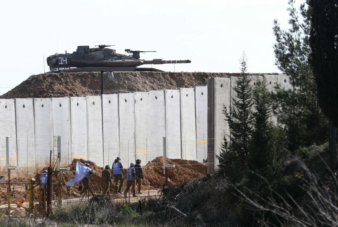 A United Nations Interim Forces in Lebanon (UNIFIL) force patrols along the border with Israel in the southern Lebanese village of Adaisseh on January 11, 2019. (AFP)