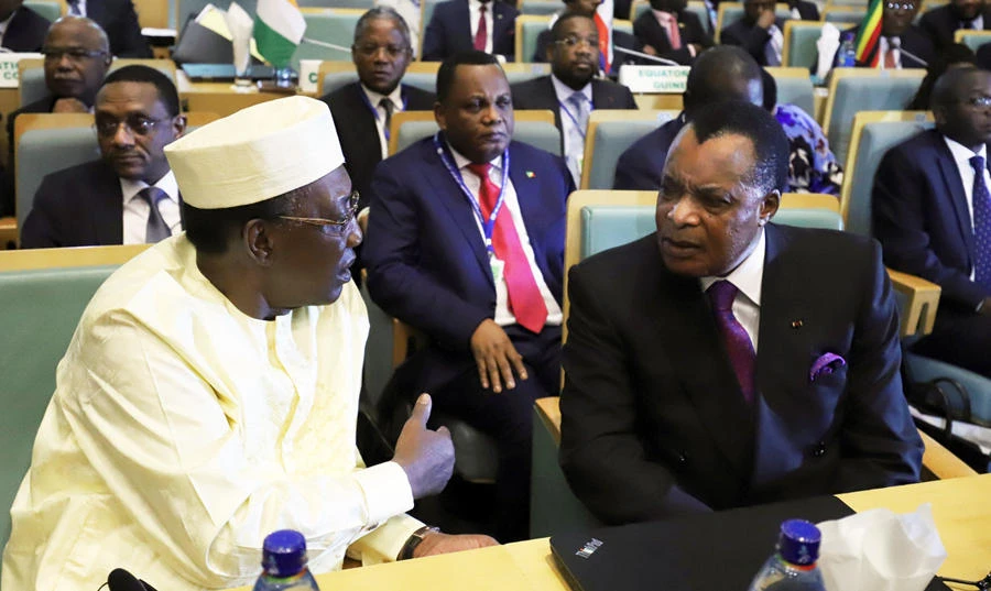 President of Chad Idriss Deby talks to Republic of the Congo President Denis Sassou Nguesso during the High Level Consultation Meetings of Heads of State and Government on the Democratic Republic of Congo election at the African Union Headquarters in Addis Ababa, Ethiopia on January 17, 2019. REUTERS/Tiksa Negeri