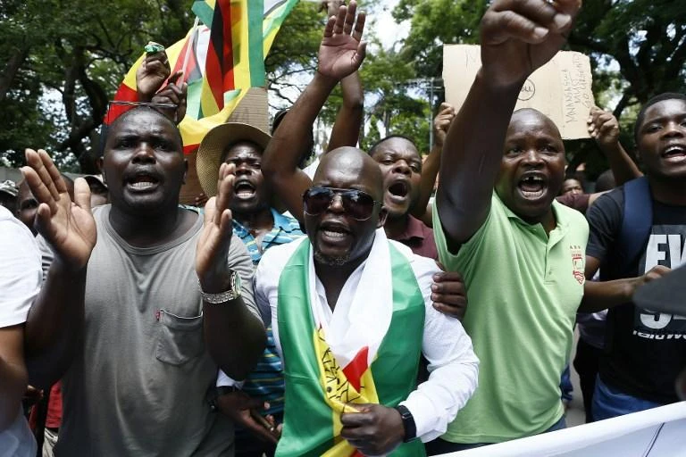 Protesters took to the streets after President Emmerson Mnangagwa increased fuel prices. (AFP)