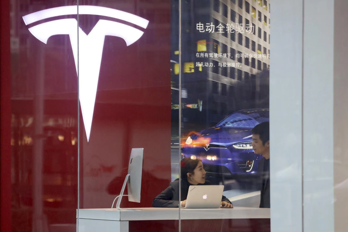 Tesla broke ground earlier this month for a factory in Shanghai, its first outside the US, to produce the Model 3 there. (AP)