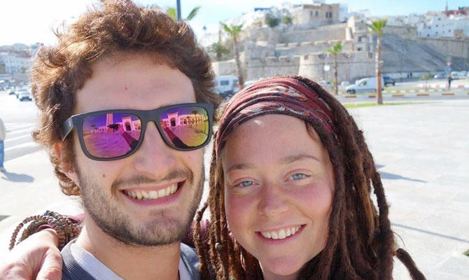 In this handout photo released on January 17, 2019 from the Facebook page dedicated to their disappearance, Luca Tacchetto (L) and Edith Blais (R) pose for a selfie picture. (AFP)
