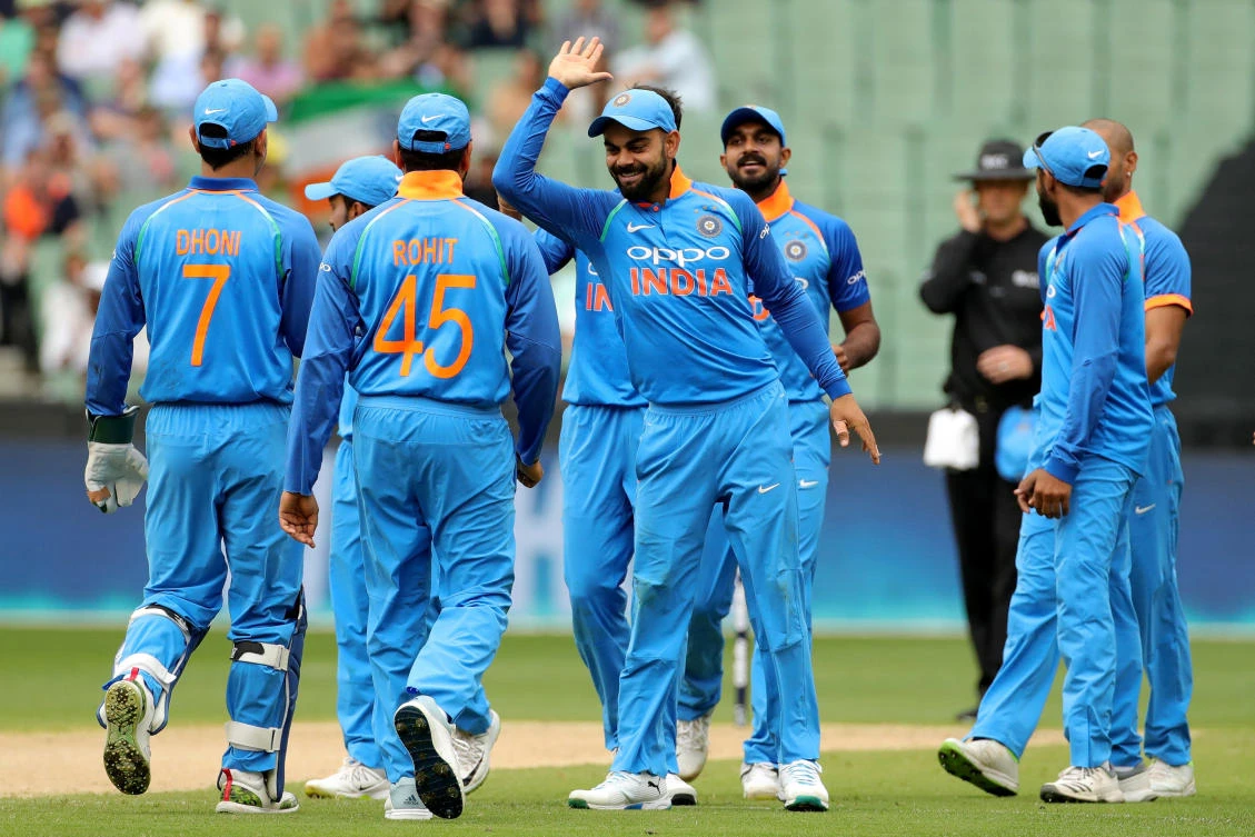 India's captain Virat Kohli celebrates with his teammates after the dismissal of Australia's Aaron Finch off the bowling of Bhuvneshwar Kumar during the third one-day international match between Australia and India at the MCG in Melbourne, Australia, January 18, 2019. (Reuters)