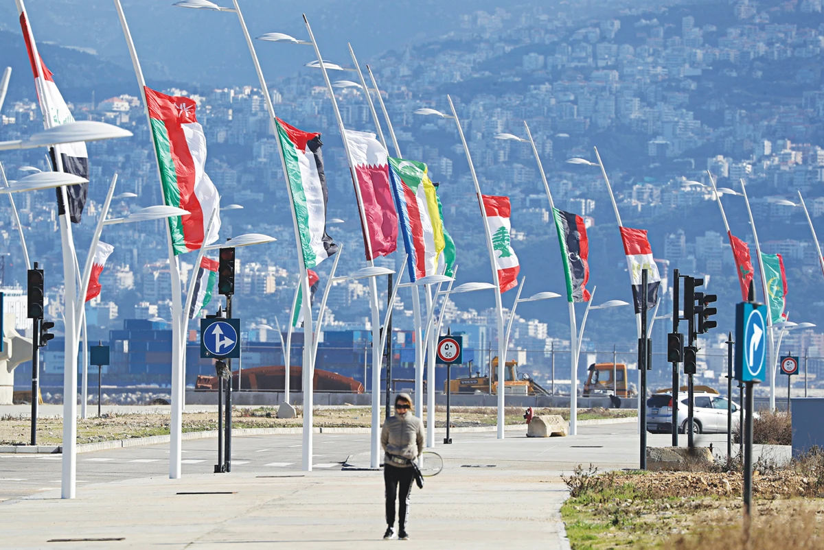 Flags of the Arab league states are seen on display ahead of the Arab Economic and Social Development Summit in Beirut on Jan. 17. (AFP)