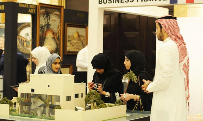 Saudis visit an interior design fair in the Red Sea city of Jeddah on November 8, 2017. (AFP)