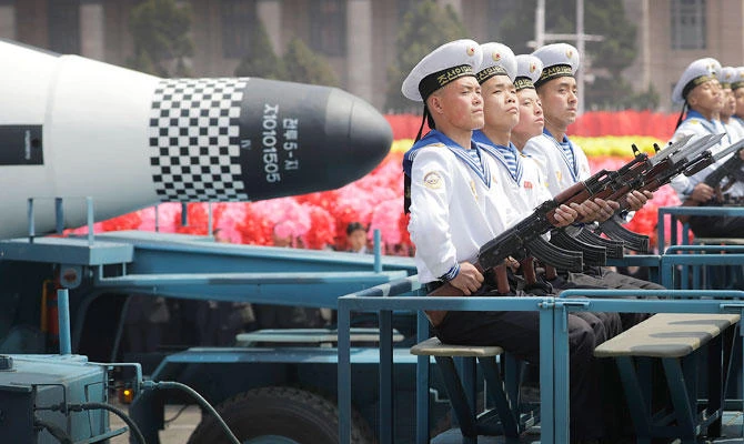In this April 15, 2017, file photo, navy personnel sit in front of a submarine-launched "Pukguksong" ballistic missile (SLBM) as it is paraded across Kim Il Sung Square in Pyongyang, North Korea. (AP)