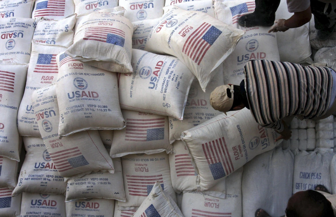 USAID has provided food aid — branded as a gift from the American people — to more than 180,000 Palestinians in the Israeli-occupied West Bank and Gaza on behalf of the World Food Program. (AP)