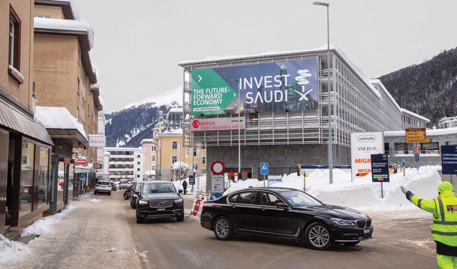 At a five-star hotel in Davos, the Saudi Arabia General Investment Authority has sponsored a prominent display proclaiming ‘The future-forward economy — Invest Saudi.’ (AN photo)