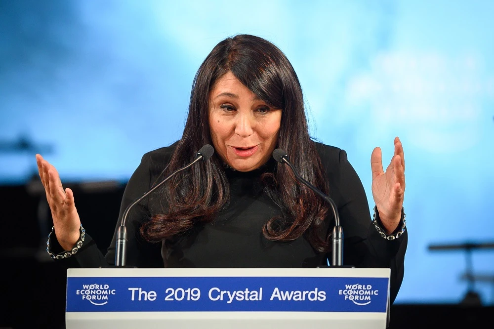 Saudi Arabian independent filmmaker Haifaa Al Mansour delivers a speech during a ceremony ahead of the World Economic Forum (WEF) 2019 annual meeting, on January 21, 2019 in Davos, eastern Switzerland. (File/AFP)