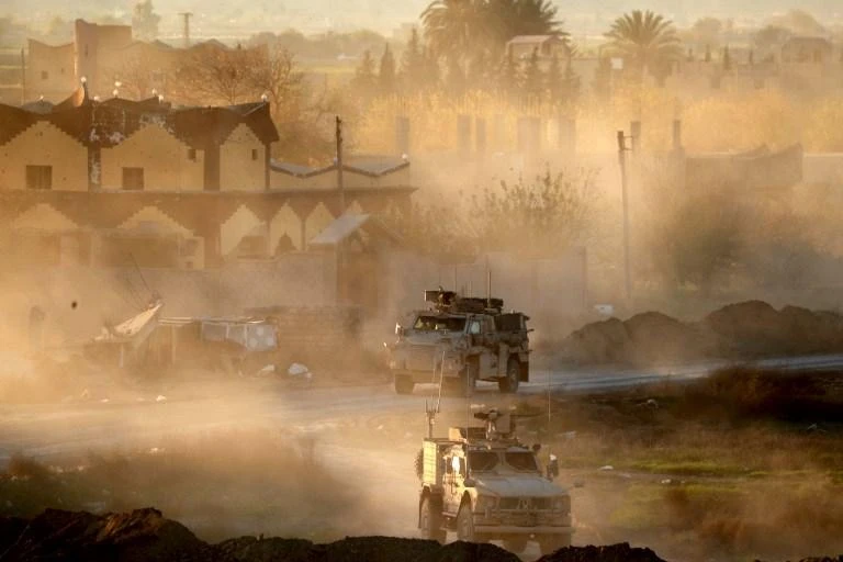 The operation was part of a broader offensive started by the Syrian Democratic Forces in September. Above, US army vehicles support the SDF in Deir Ezzor. (AFP)