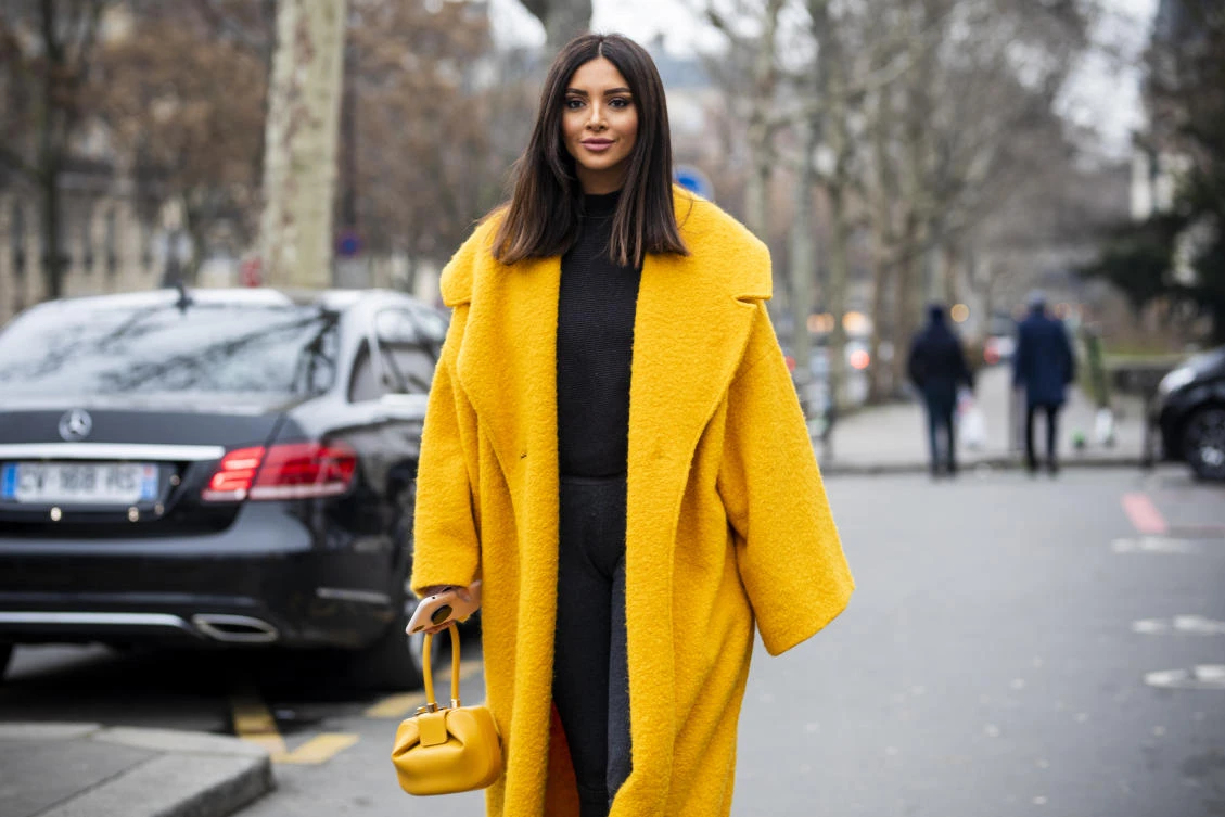 Lebanese blogger Nathalie Fanj braves the snow for her fashion fix in Paris
