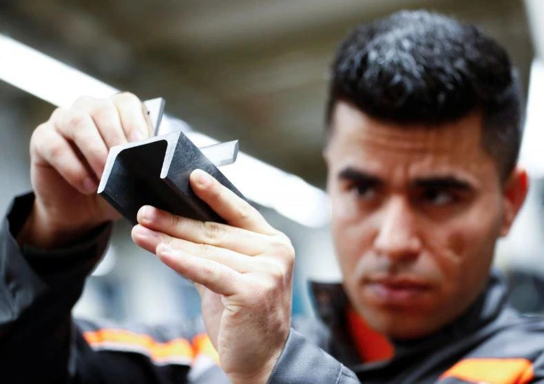 Qudratullah Hotak, a 25-year-old refugee from Afghanistan and one of 24 trainees of Ford Germany’s so-called Equipment Qualification (EQ) program to integrate migrants in a booming labor market. (Reuters/Wolfgang Rattay)