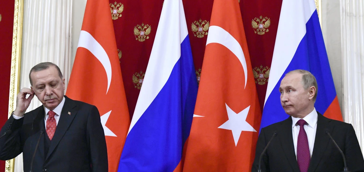 Turkey's President Recep Tayyip Erdogan and Russian President Vladimir Putin attend a joint news conference following their talks in the Kremlin in Moscow. (AP)