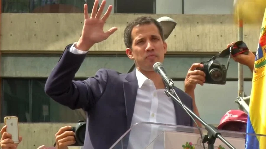 Venezuelan opposition leader Juan Guaido declared himself interim president on Wednesday, winning the backing of Washington and many Latin American nations and prompting socialist Nicolas Maduro to break relations with the United States. (Reuters)