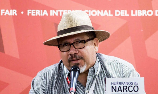 In this file picture taken on May 15, 2017 Mexican journalist Javier Valdez speaks during the presentation of his book "Huerfanos del Narco" in the framework of the International Book Fair in Guadalajara, Mexico. (AFP)