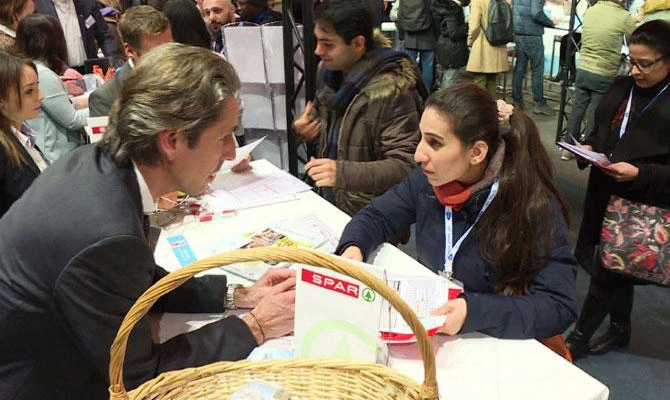 With a hard line on immigration, Austria sees its employers using their charms to recruit refugees, while labour shortages threaten a thriving economy. (AFP)