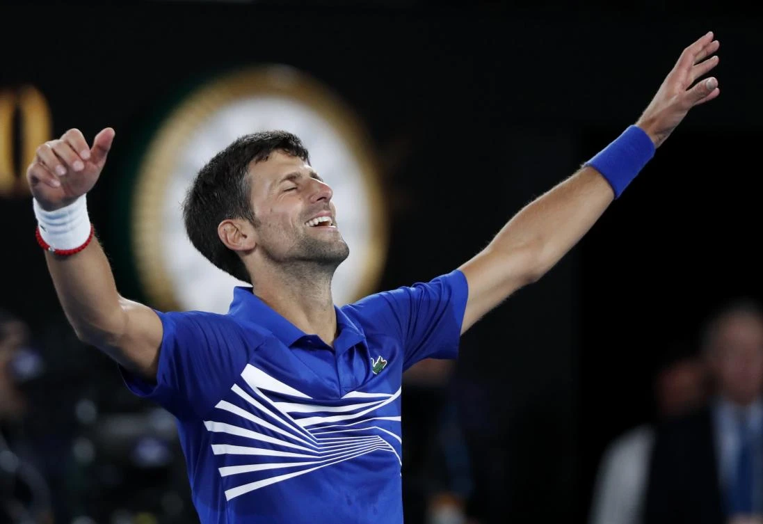 Serbia’s Novak Djokovic celebrates after winning the Australian Open title against Spain’s Rafael Nadal on Sunday, January 27. (Reuters)