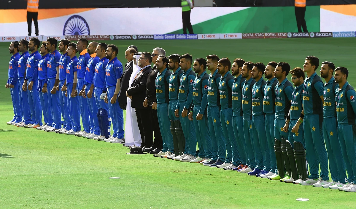 Indian and Pakistan players line up for the national anthem just before the start of the one day international (ODI) Asia Cup cricket match between Pakistan and India at the Dubai International Cricket Stadium in Dubai on Sept.19, 2018. (AFP)