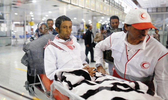Prisoner freed Saudi prisoner Moussa Awaji at Sanaa airport on Tuesday after he was released by Iran-backed Houthi militias. In Mokha, a UAE TV cameraman and five civilians were killed in a bomb blast. (REUTERS)