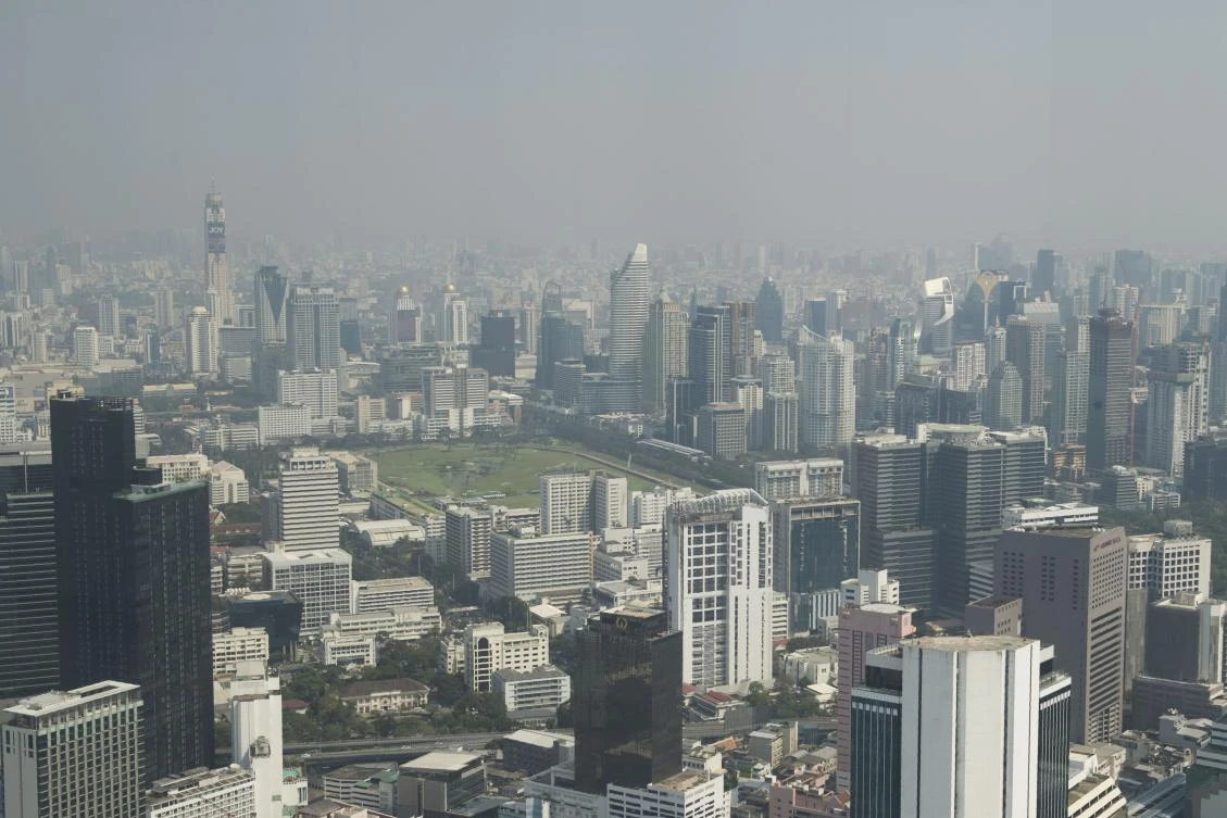 The horserace track of The Royal Bangkok Sports Club (C) is seen from the King Power Mahanakhon skyscraper, Bangkok's highest observation deck, during a polluted day in the city on January 28, 2019. (AFP)