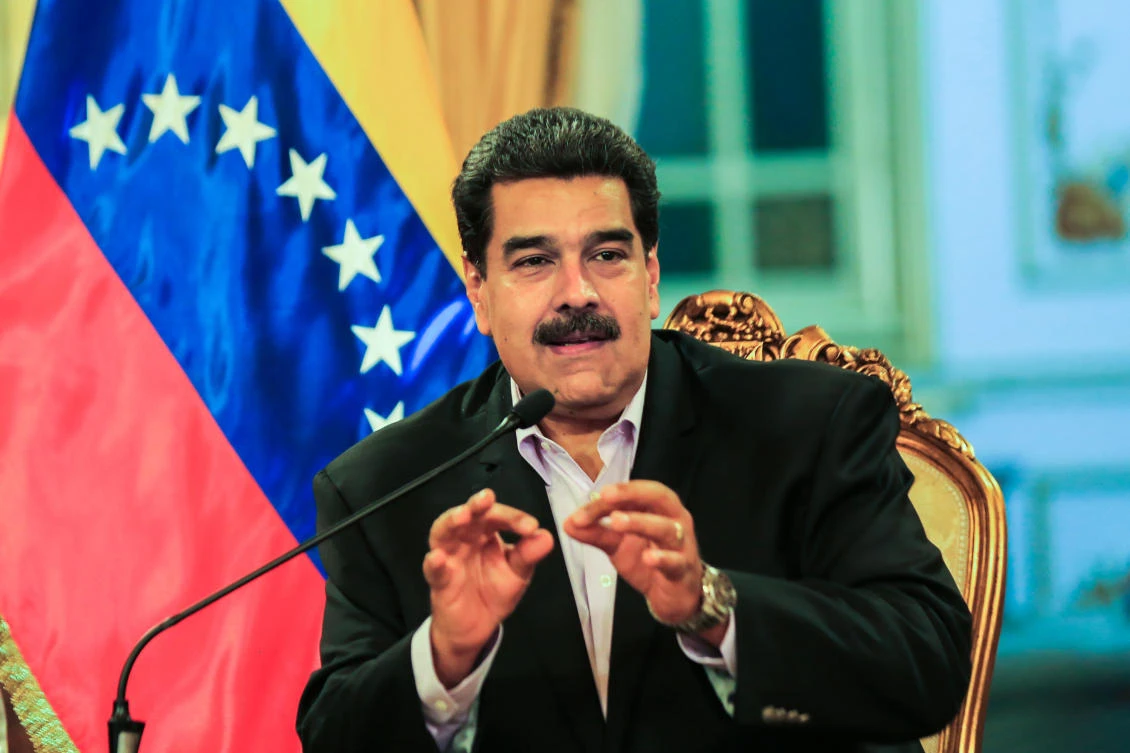 Handout picture released by the Venezuelan presidency showing Venezuelan President Nicolas Maduro talking during a meeting with Venezuelan diplomats returning from the US, at the Miraflores presidential palace in Caracas on Juanary 28, 2019. (AFP/Venezuelan Presidency)