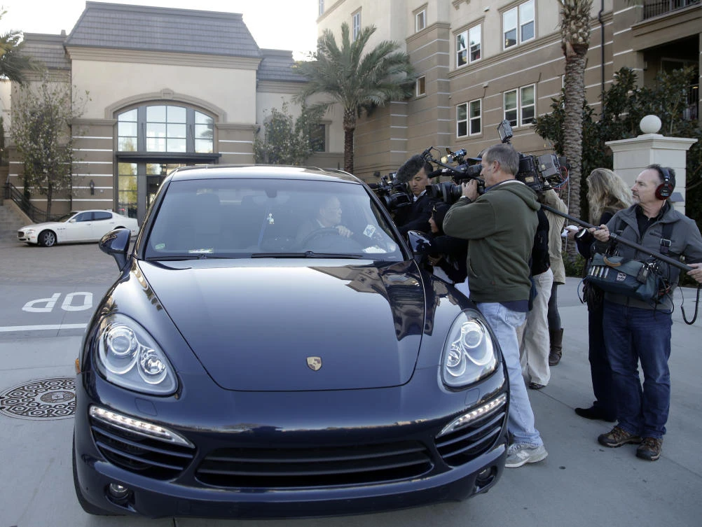 File photo shows resident Jin-Jou Lu talking to reporters after FBI raid of an upscale apartment complex where a birth tourism business was held, in Irvine, Calif. (AP)