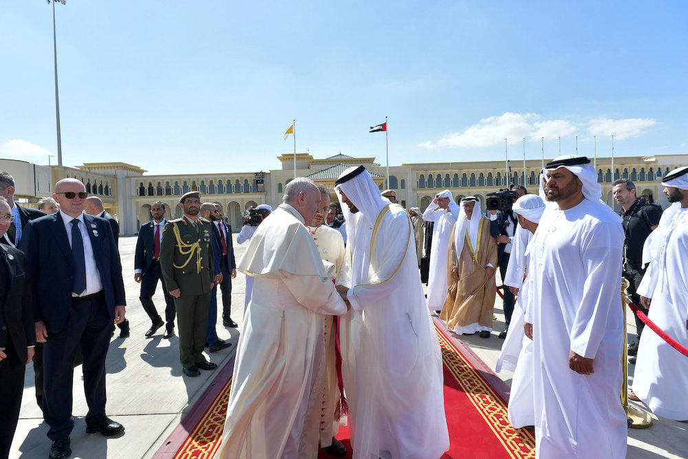 Pope Francis shakes hands with Abu Dhabi's Crown Prince Mohammed bin Zayed Al-Nahyan during a farewell ceremony before leaving Abu Dhabi, United Arab Emirates. (Reuters)