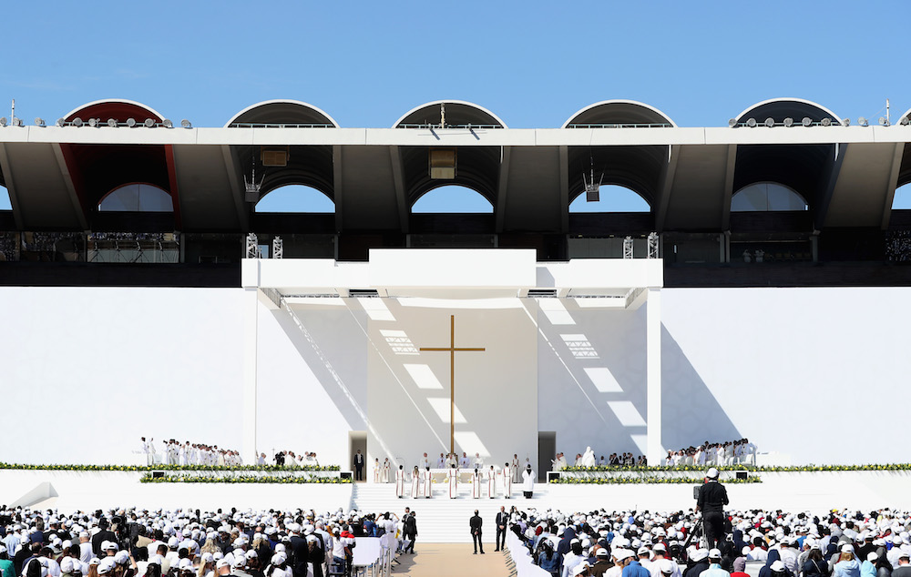 Pope Francis celebrates mass at Zayed Sports City Stadium. (Getty Images)