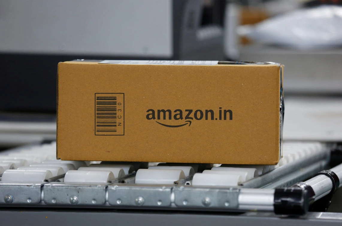 A shipment moves on a conveyor belt at an Amazon Fulfillment Center (BLR7) on the outskirts of Bengaluru, India. (File Photo/Reuters)