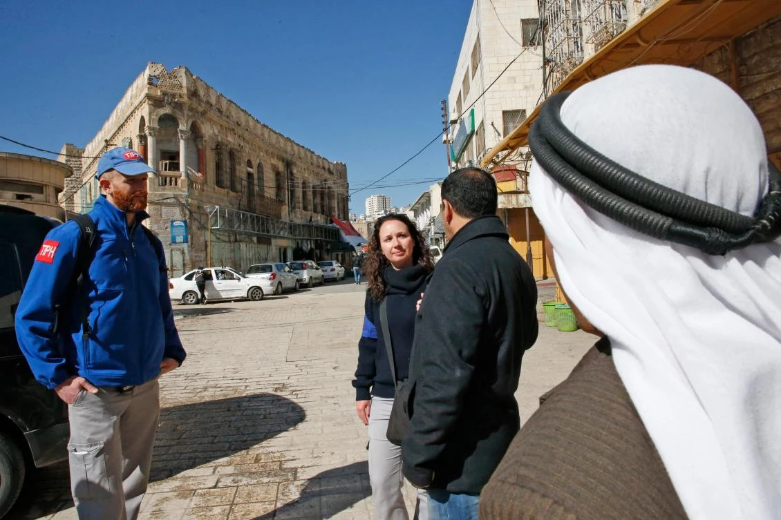 Above, members of the Temporary International Presence in Hebron walk in the West Bank city. (AFP)