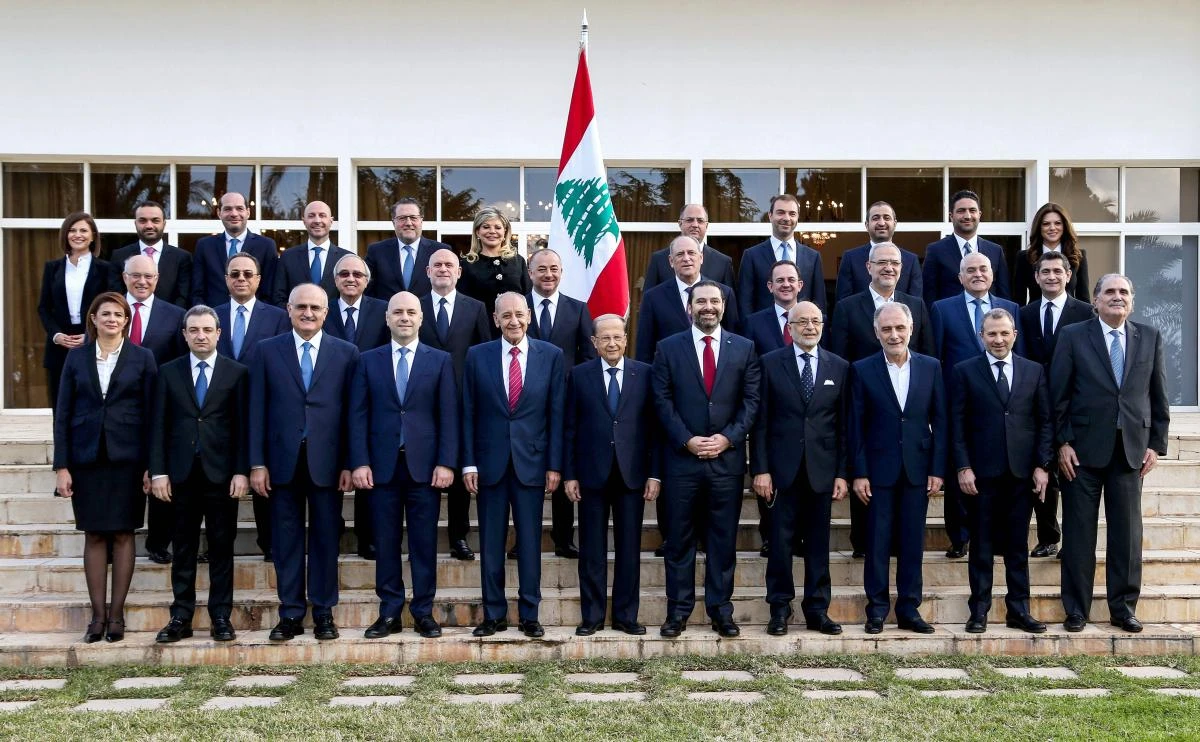 The new Lebanese Cabinet pose for a group photo with President Michel Aoun, first row center, Prime Minister Saad Hariri, first row center right, and Parliament Speaker Nabih Berri (first row center left during their meeting on February 2. (AFP)