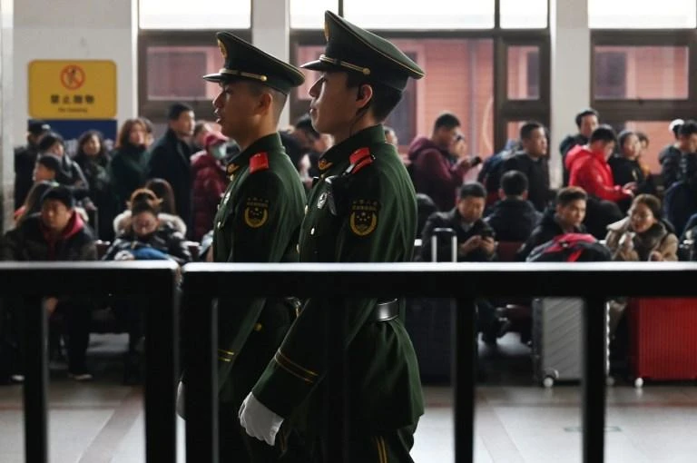 Yang Hengjun was detained by Chinese authorities in the southern city of Guangzhou while waiting for a transfer to Shanghai last month. (AFP)