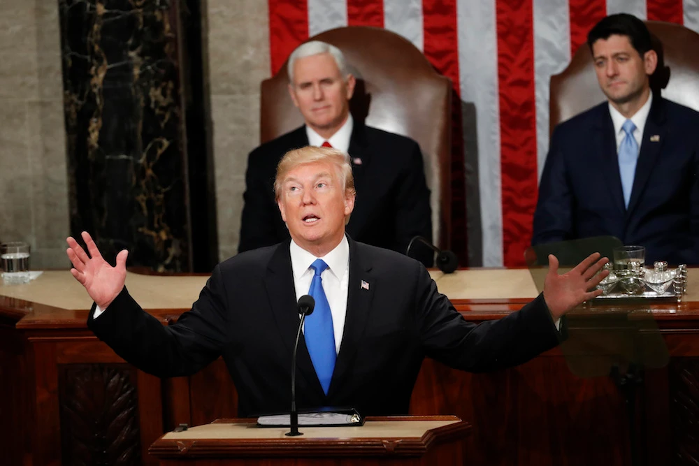 Trump says he wants US military in Iraq to ‘watch Iran’ and that sending military to Venezuela 'an option' in a CBS interview. (File photo/AP)