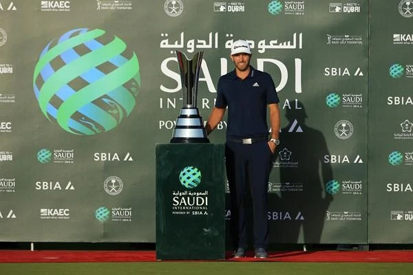 Dustin Johnson endured a roller-coaster back nine but birdies on the last two holes at the Royal Greens handed him a two-shot win in the inaugural Saudi International on Sunday. (Getty Images)