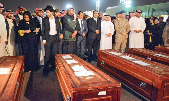 Bodies of five demining experts killed in Yemen arrived in Riyadh on Saturday night. (SPA)
