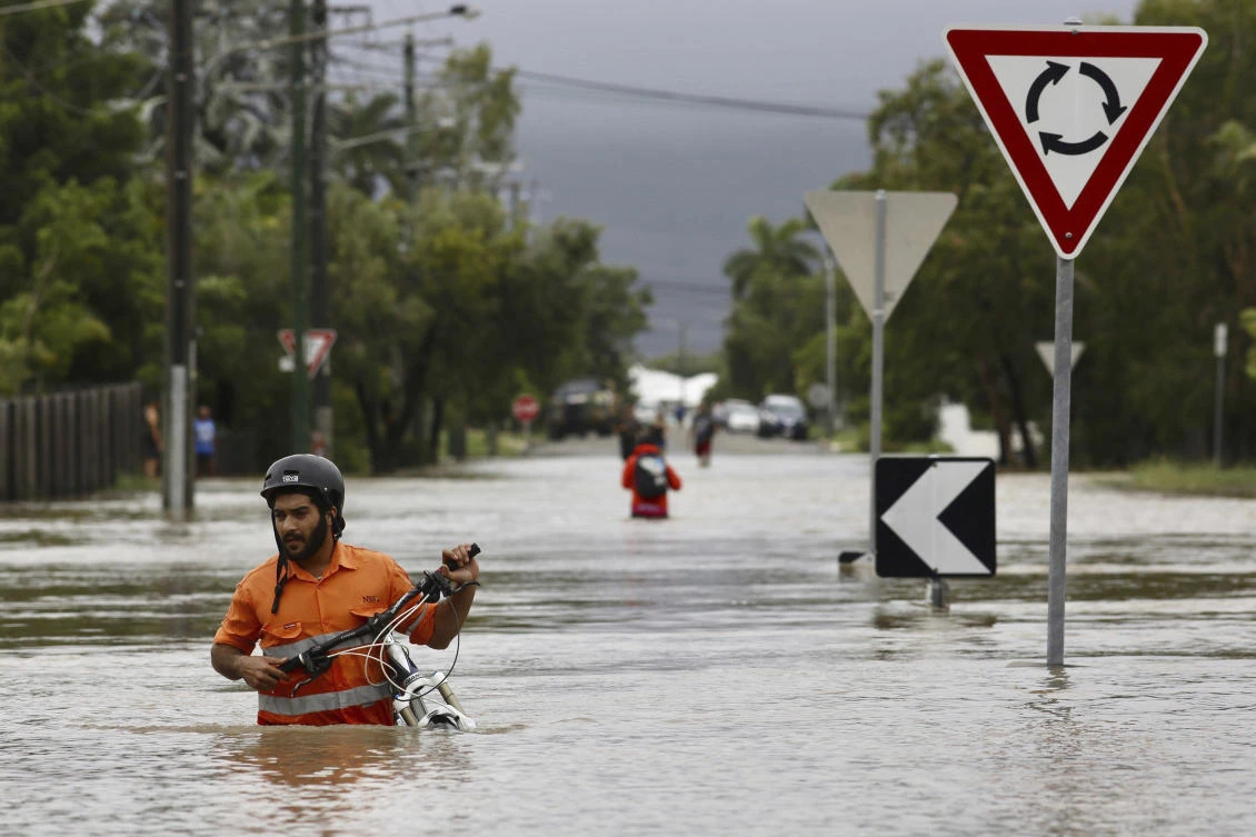 The recent downpour has seen some of Australia’s tropical north get a year’s worth of rainfall in a week. (AAP Image via AP)