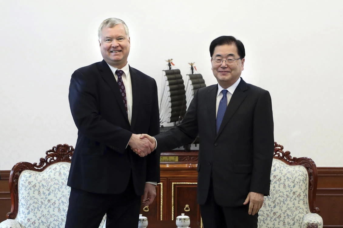 US special envoy for North Korea Stephen Biegun, left, with South Korean national security adviser Chung Eui-yong during a meeting at the Presidential Blue House in Seoul on Monday, Feb. 4, 2019. (South Korea Presidential Blue House via AP)