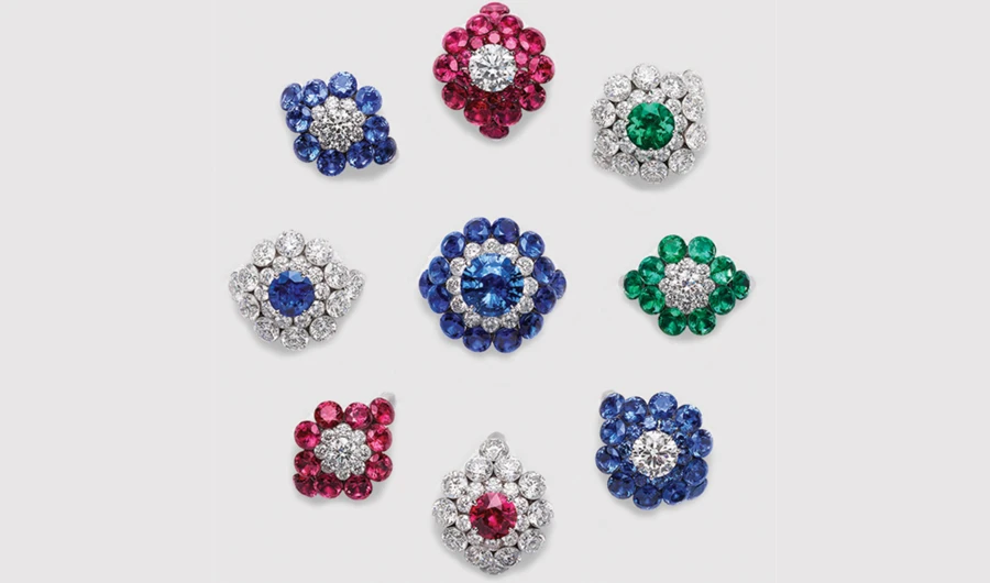 Each cluster in the ‘Magical Setting’ collection is centered on a significant single stone and encircled throughout with other unusually large stones.