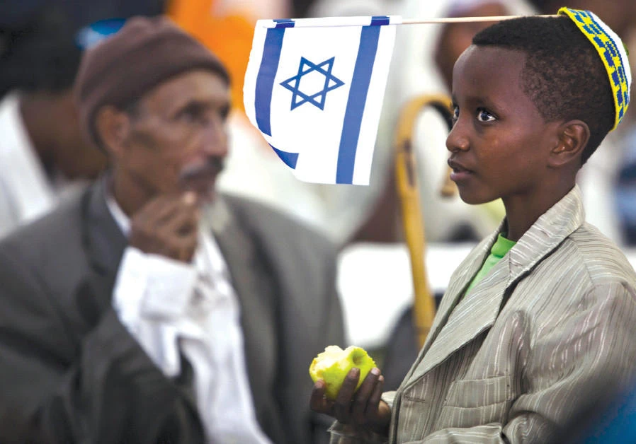 The Israeli government has begun the process of bringing some of the remaining 8,000 Jews in Ethiopia to Israel. Above, a young immigrant after arriving at Ben-Gurion Airport. (Reuters)