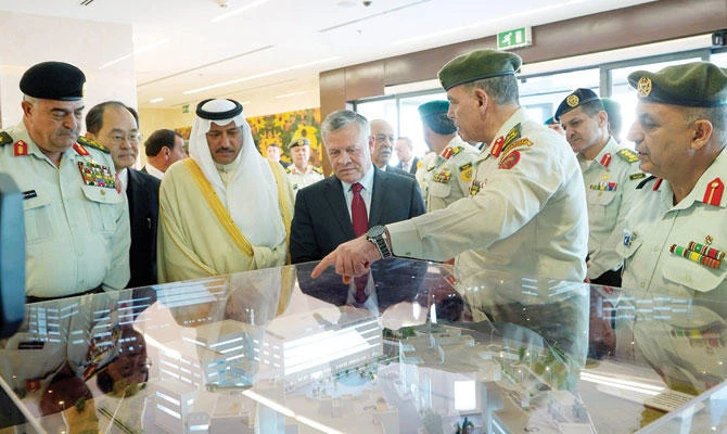 Jordan’s King Abdullah and Saudi Ambassador to Jordan Prince Khalid bin Faisal bin Turki visit Queen Alia Military Hospital in Amman. (Photo/Petra)