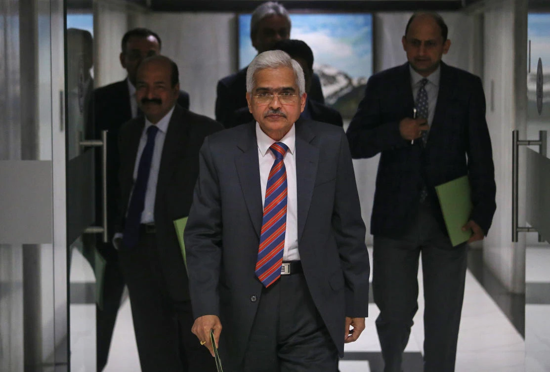 Reserve Bank of India boss Shaktikanta Das prepares to announce the interest rate cut. (Reuters)
