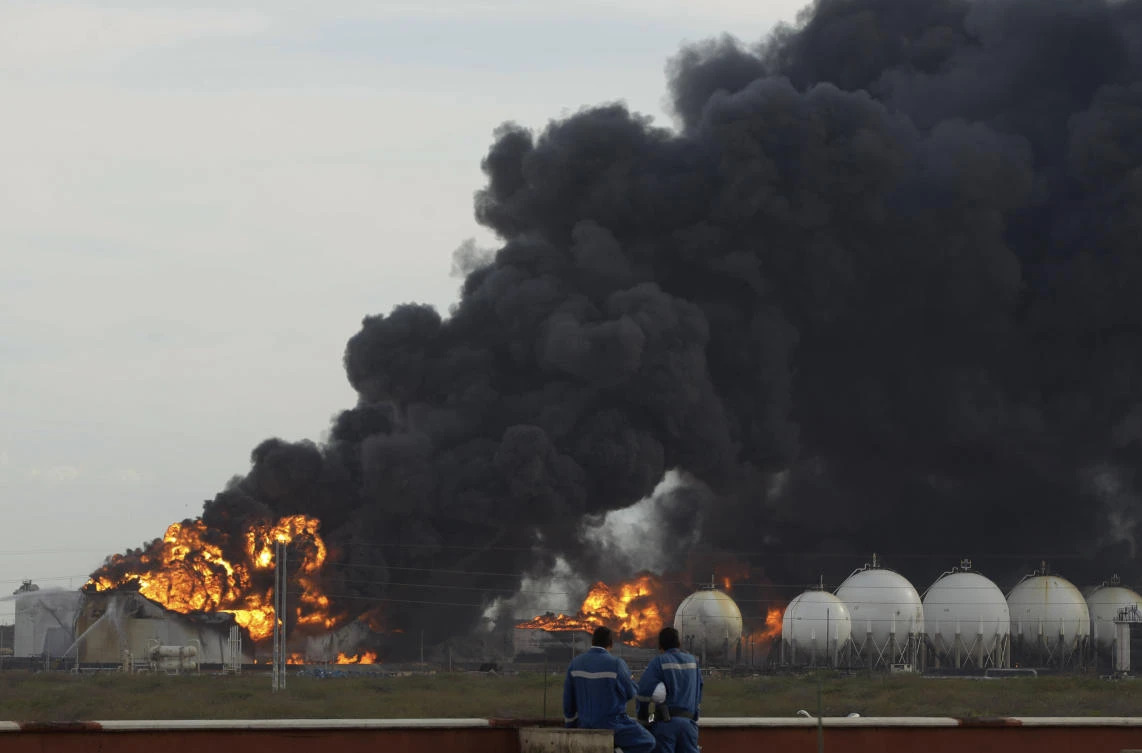 Conditions are so dangerous at the refinery, that oil worker Nieves Ribullen says workers clock in every day with memories of a massive explosion that killed dozens of workers in 2012. (AP)