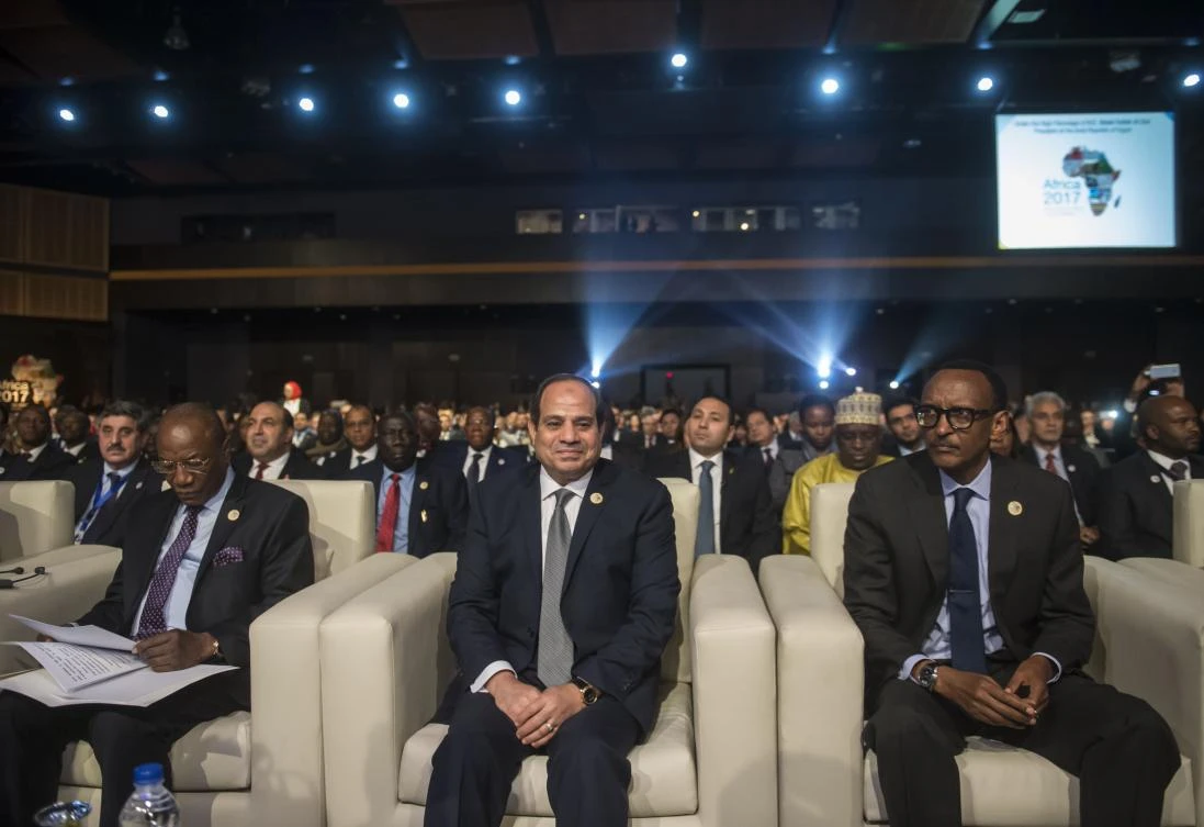 In this file photo taken on December 8, 2017, Egyptian President Abdel Fattah al-Sisi (C), Guinea's President and African Union (AU) chairman Alpha Conde (L) and Rwandan President Paul Kagame (R) attend the opening session of the Africa 2017 Forum in the Red Sea resort of Sharm el-Sheikh. (AFP)