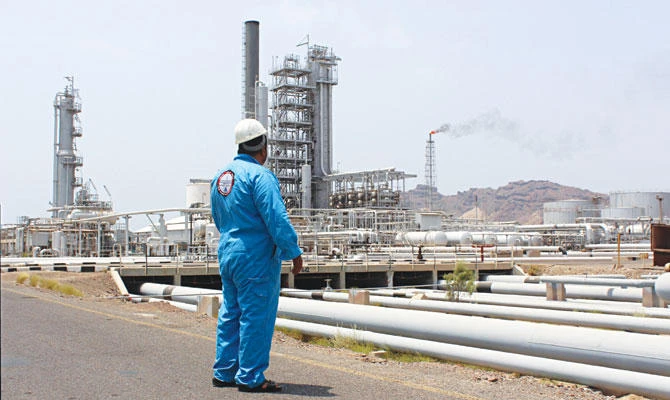 A Yemeni oil worker looks out at the Aden refinery after it was reactived in 2016. The port city is key to Yemen’s plans to boost crude production. (AFP)