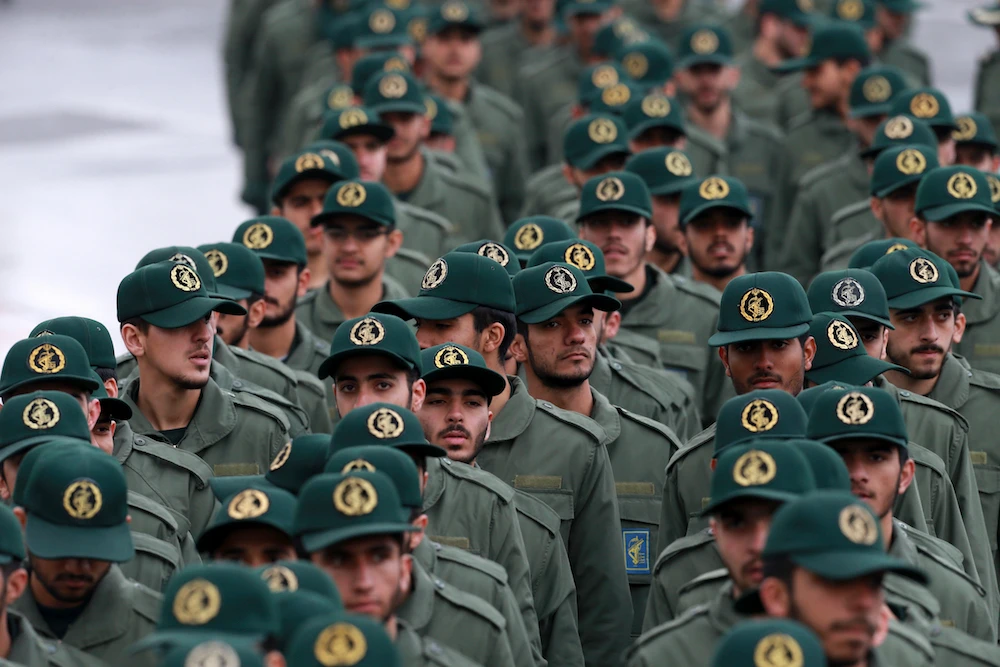 Iranian Revolutionary Guard members arrive for a ceremony celebrating the 40th anniversary of the Islamic Revolution. (AP)
