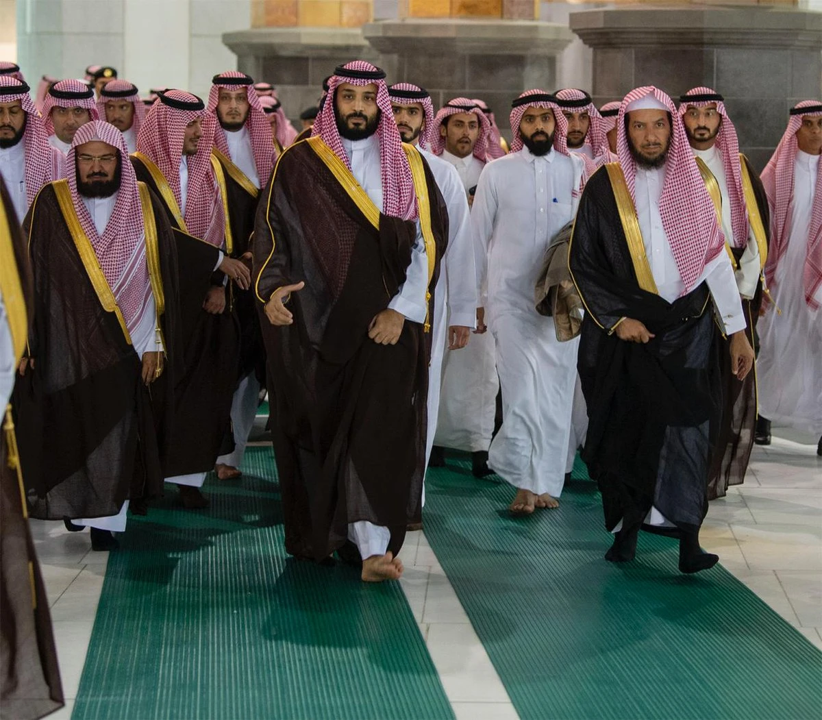 Joined by government ministers he looked at the building work. (SPA)