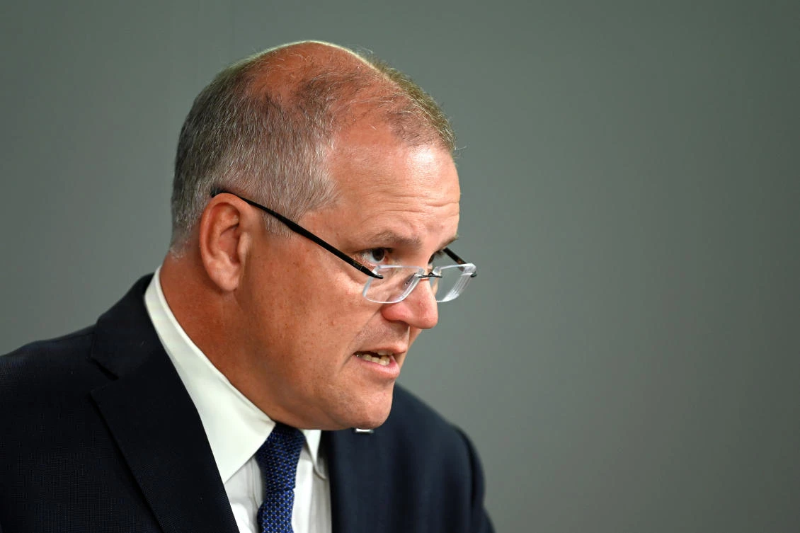 Prime Minister Scott Morrison was defeated by MPs who insisted refugees held in offshore facilities have the right to be transferred to Australia for medical treatment. (AFP/File)