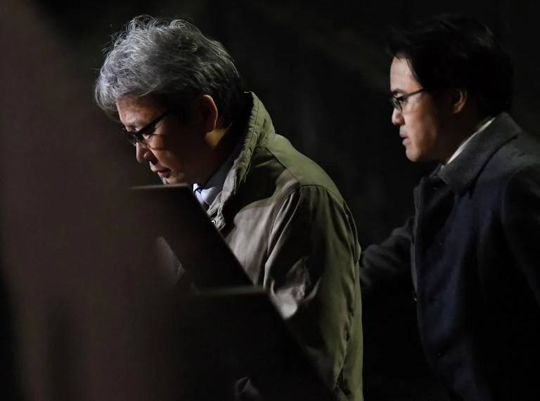 Motonari Otsuru, left, said previously Ghosn is unlikely to be bailed before his case reaches the court. (AFP)
