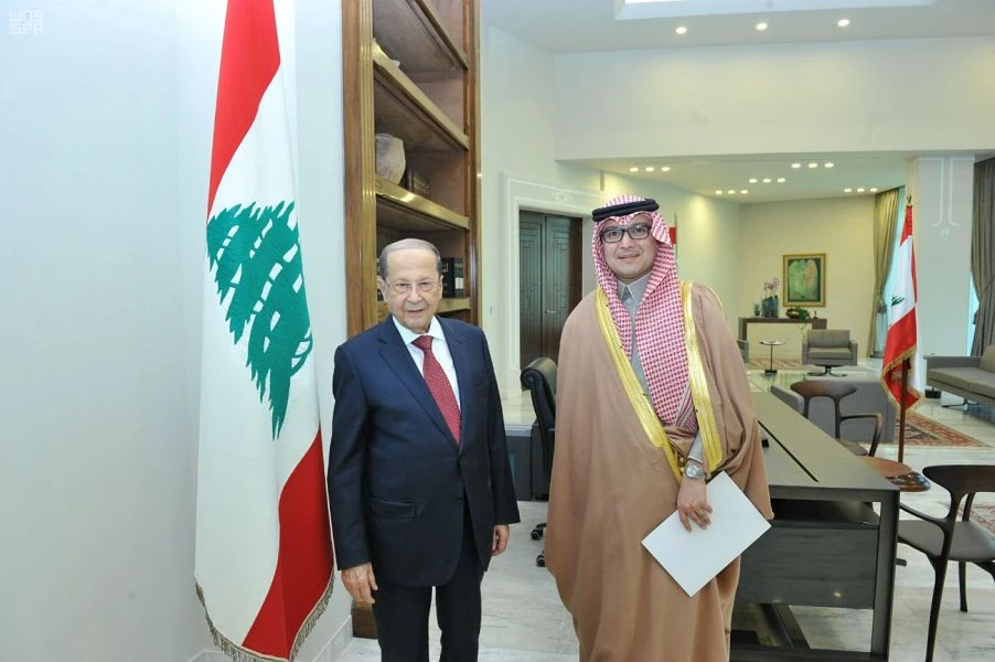 Saudi Ambassador to Lebanon Walid bin Abdullah Bukhari (R) meeting with Lebanese president Michel Aoun. (SPA)