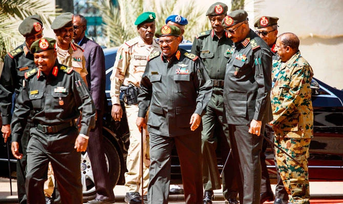 Sudanese President Omar al-Bashir arrives to address members of the Popular Defence Force (PDF), a paramilitary group, in the capital Khartoum on February 12, 2019. (AFP)