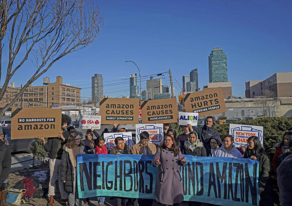 Activists and community members who opposed Amazon's plan to move into Queens rally in celebration of Amazon's decision to pull out of the deal, in the Long Island City neighborhood, on February 14, 2019 in the Queens borough of New York City. (Drew Angerer/Getty Images/AFP)